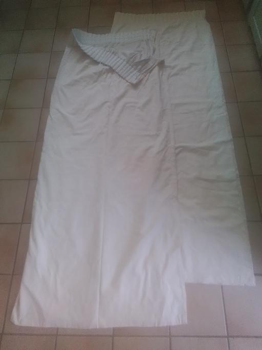  — ONE PAIR OF CREAM EMBOSSED CURTAINS LINED