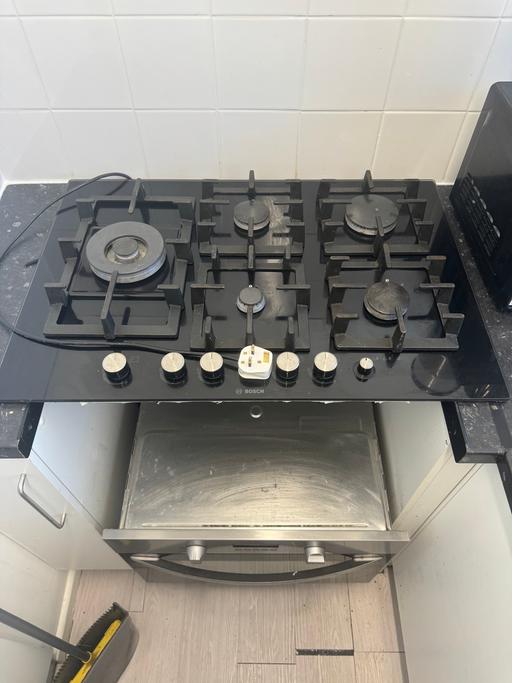  — Cooker and oven