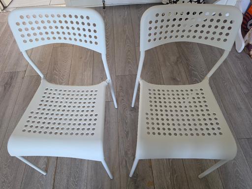  — 2 x white chairs