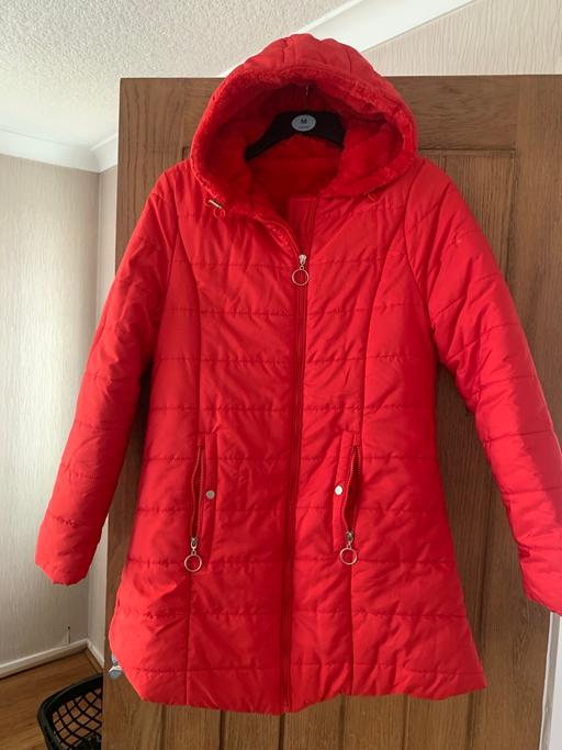  — Woman’s Red Hooded Jacket