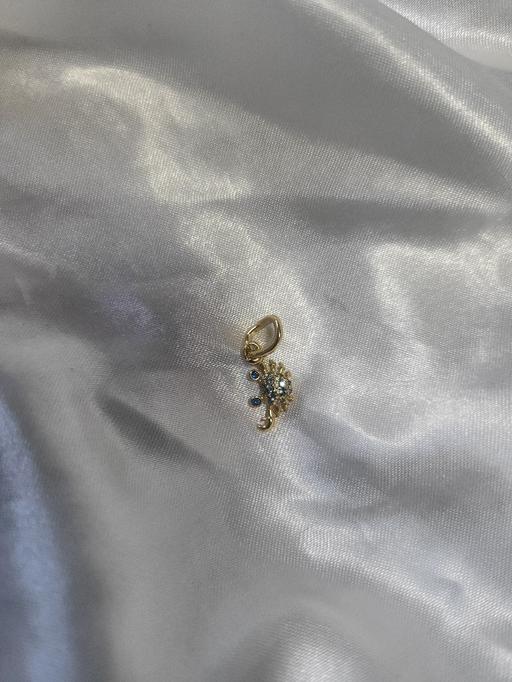  — Pandora gold-plated crab dangle charm feature