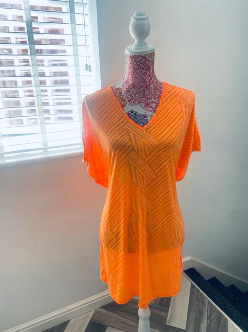  — (8/12) BEACH COVER UP