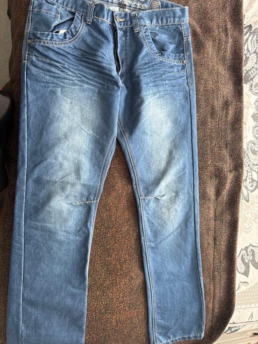  — Jeans