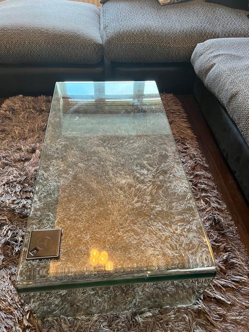  — Glass Table and Rug