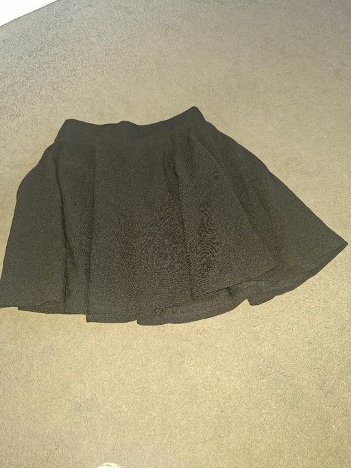  — girls skirt with shorts underneath size Xs