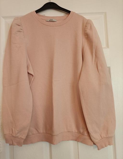  — pink sweater size M
