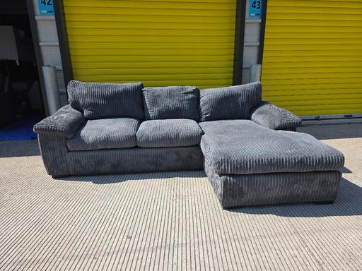  — grey corded L shape sofa