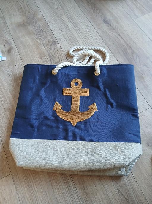  — Brand New Bag