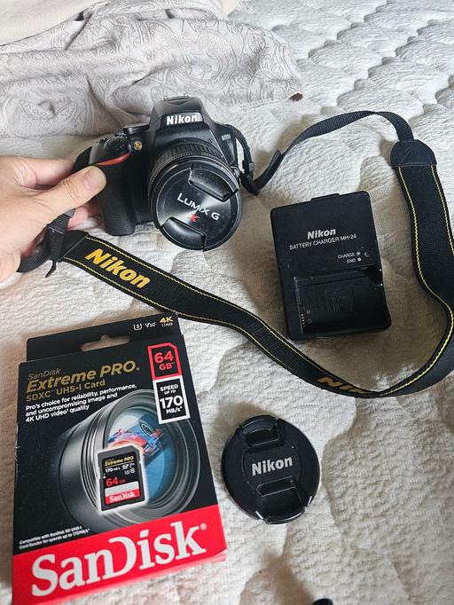  — Nikon