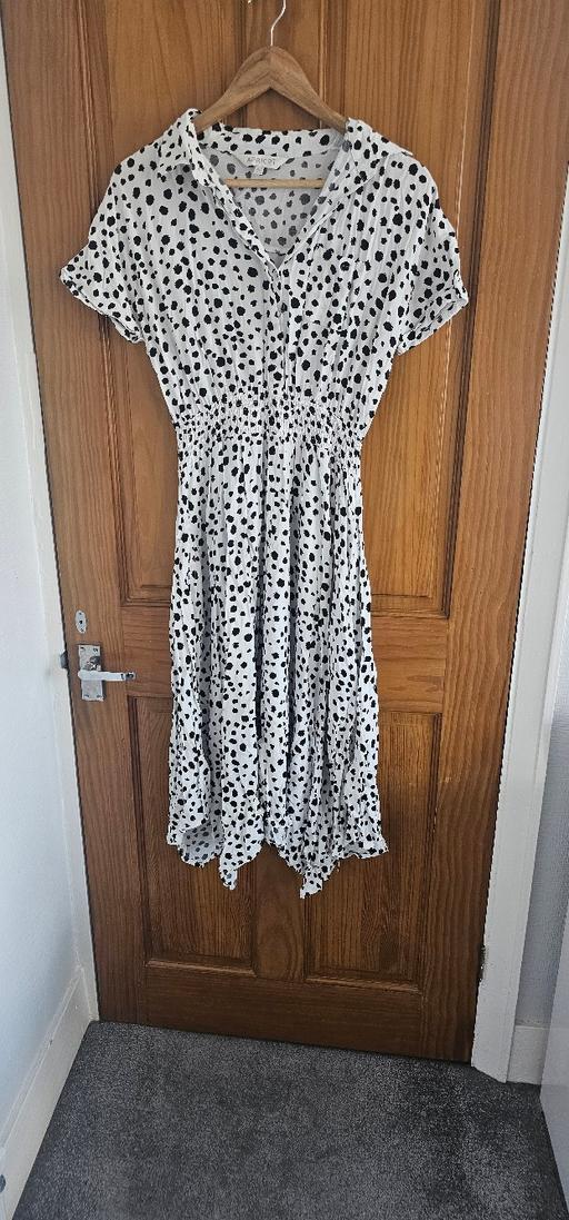  — White with black spot print dress