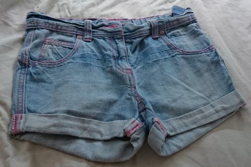  — Girls denim shorts by Tesco Aged 10-11 years