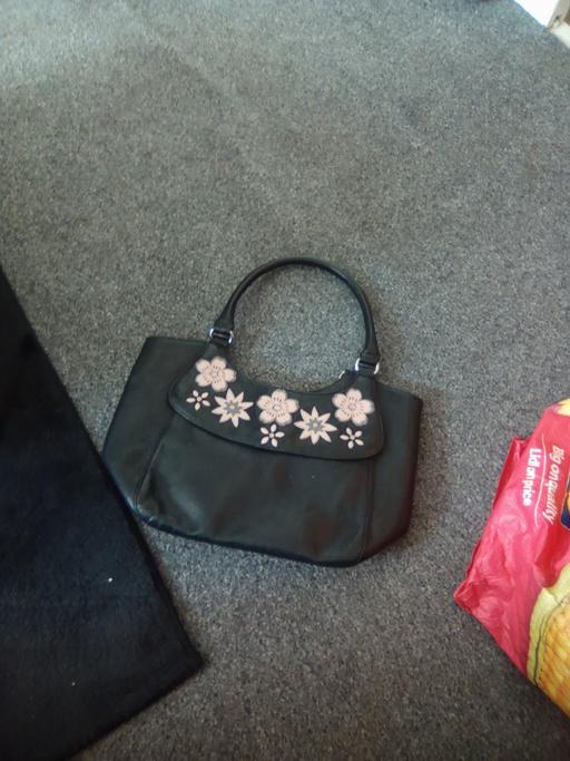  — handbag