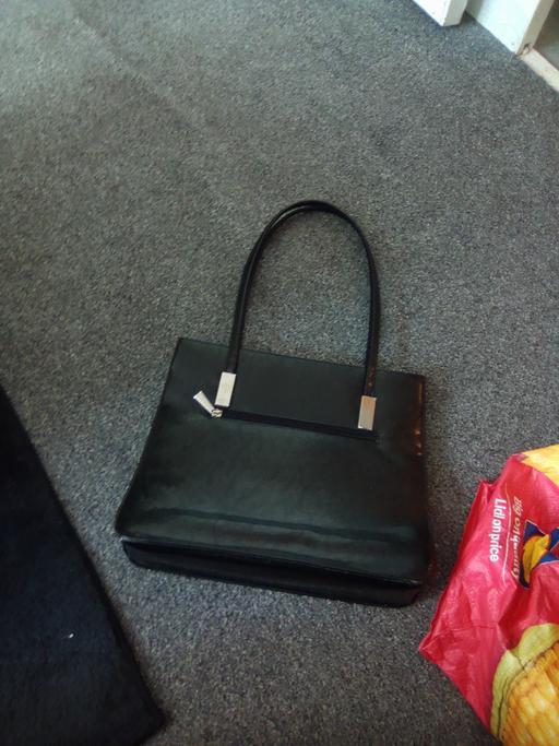  — handbag