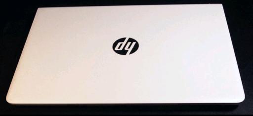  — hp 14 Rose gold and white laptop