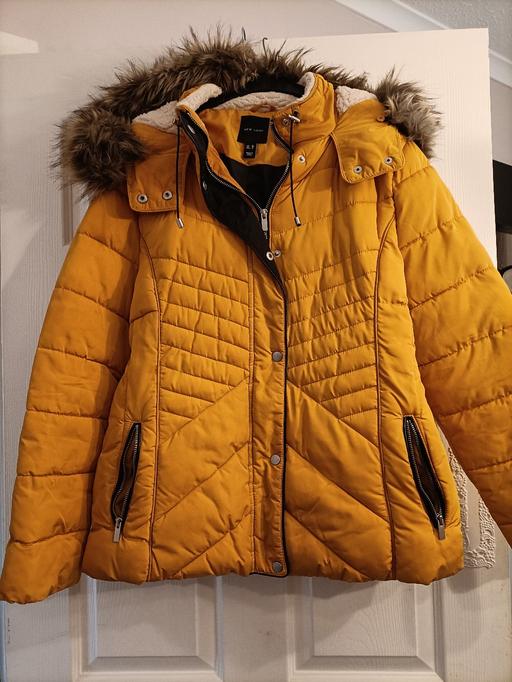  — mustard winter coat size 16