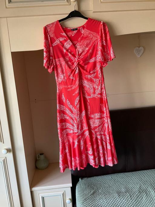  — Dress