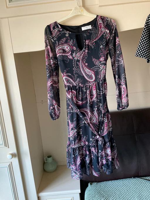  — Dress