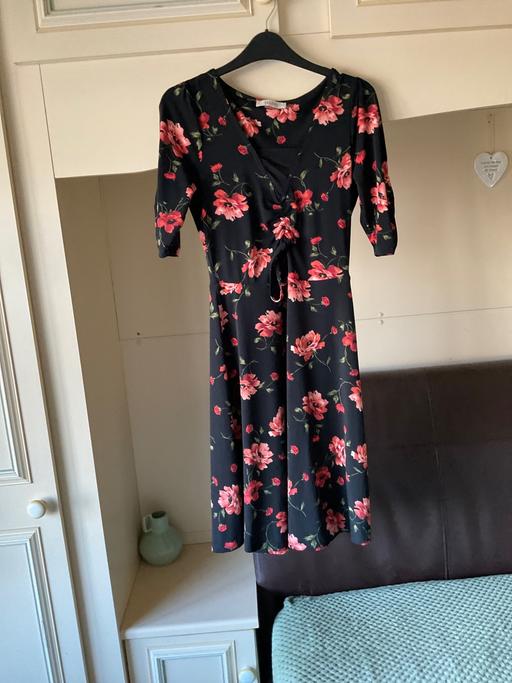  — Dress