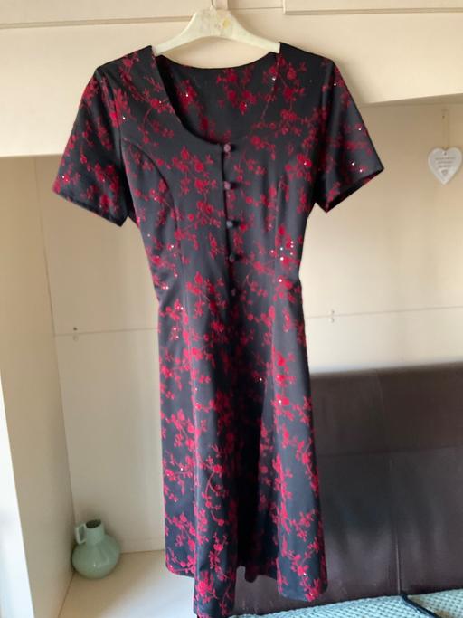  — Dress