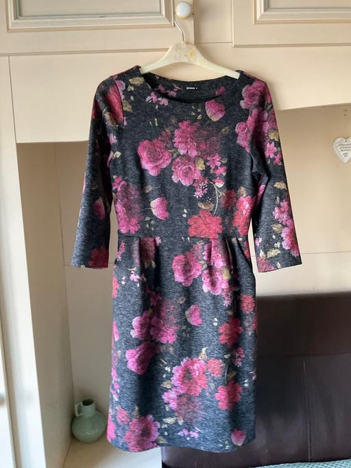  — Dress
