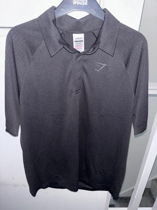  — Gymshark black polo