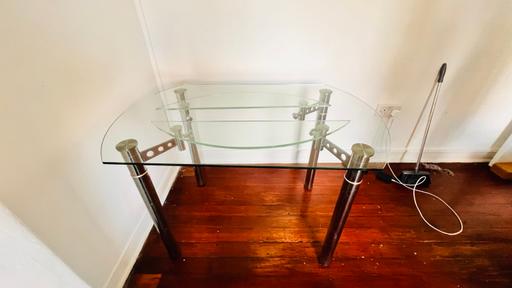  — Round extendable glass dinning table