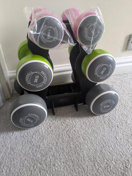  — Dumbells set. 5,3,1.5kg with stand.