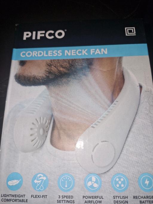  — cordless neck fan, brand new still in box. no