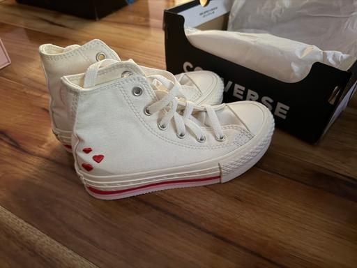  — Converse