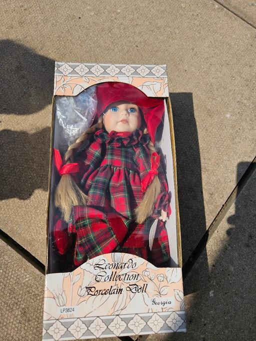  — porcelain doll new in box