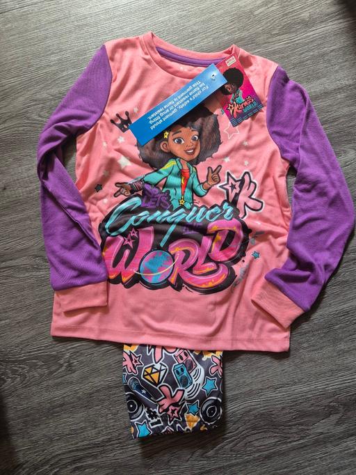  — new Karma's World Pjs