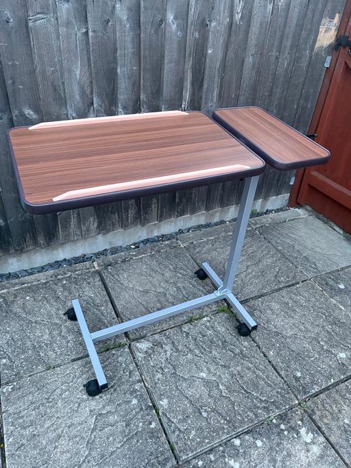  — Over table