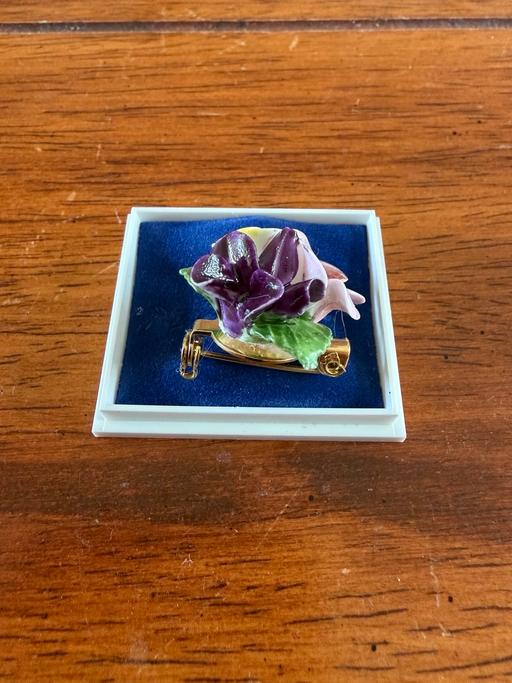  — China brooch