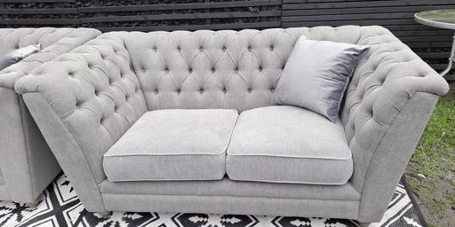  — Grey 2 seater sofa..