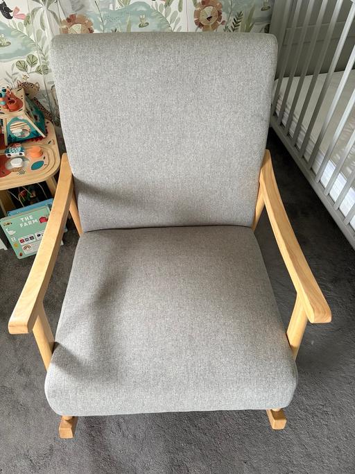  — Grey rocking chair