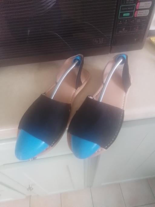  — BRAND NEW BLACK SANDELS