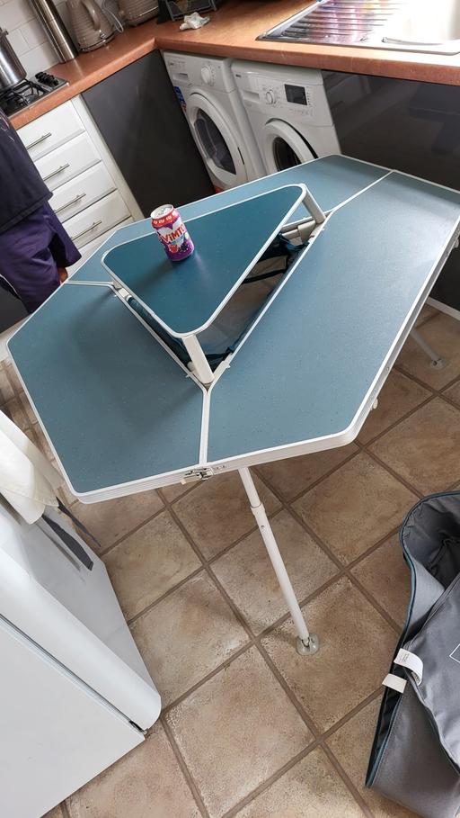  — TABLE..FOLDS AWAY INTO CARRYING BAG