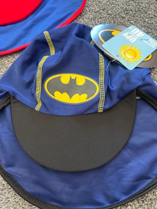  — Baby sun hats Batman/Superman. New