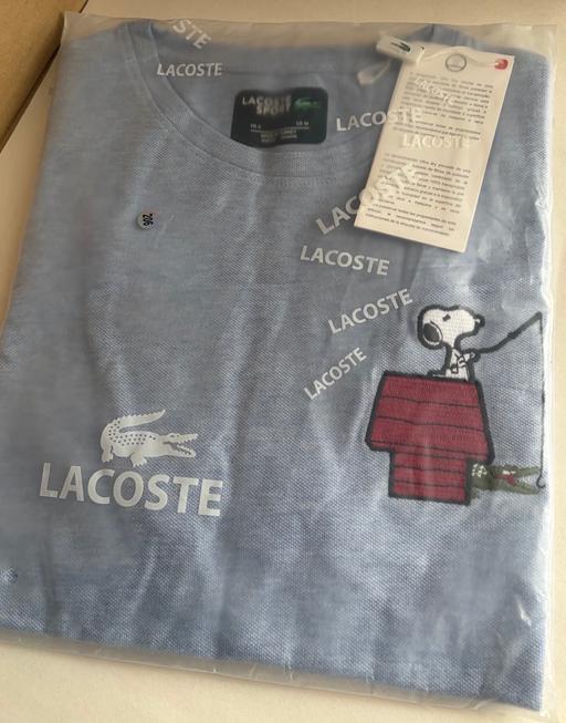  — Lacoste