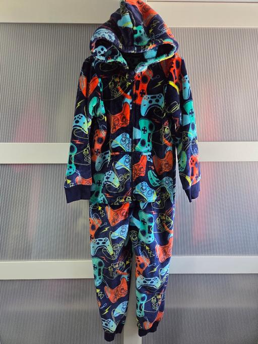  — Age 6-7 NUTMEG onesie