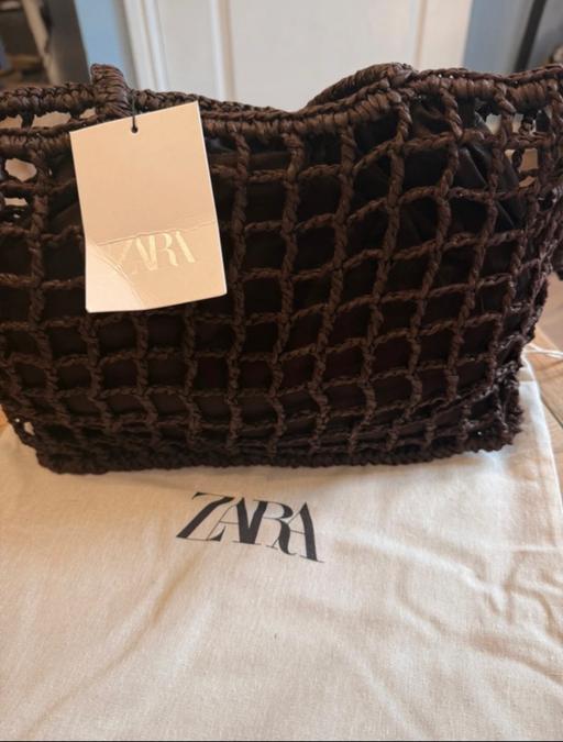  — Zara brown braided bag