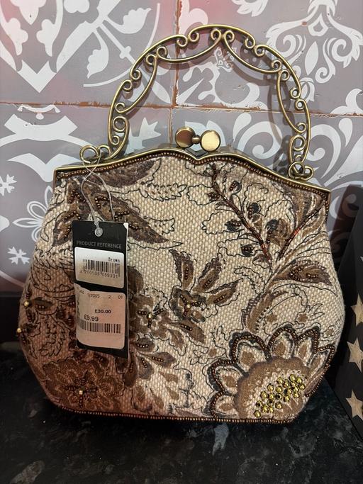  — Small new bag