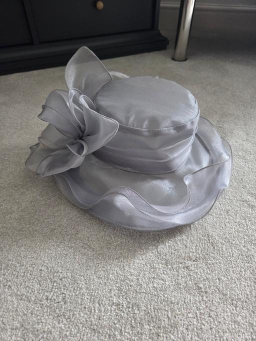  — new silver hat