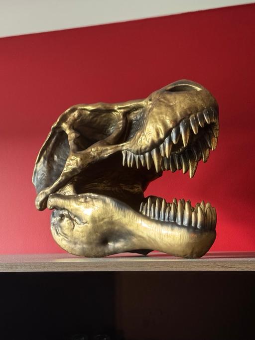  — GOLD T-REX SKULL ORNAMENT