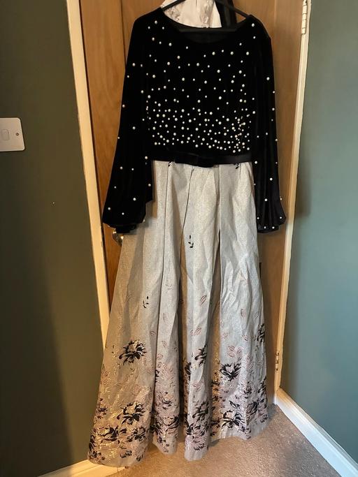  — Dress