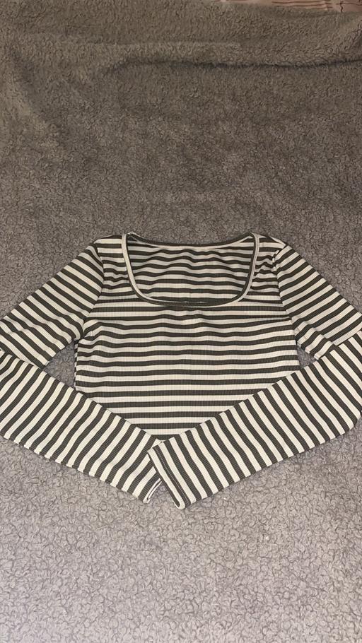  — women’s top