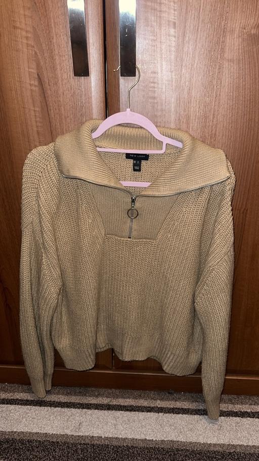  — Women’s khaki sweater
