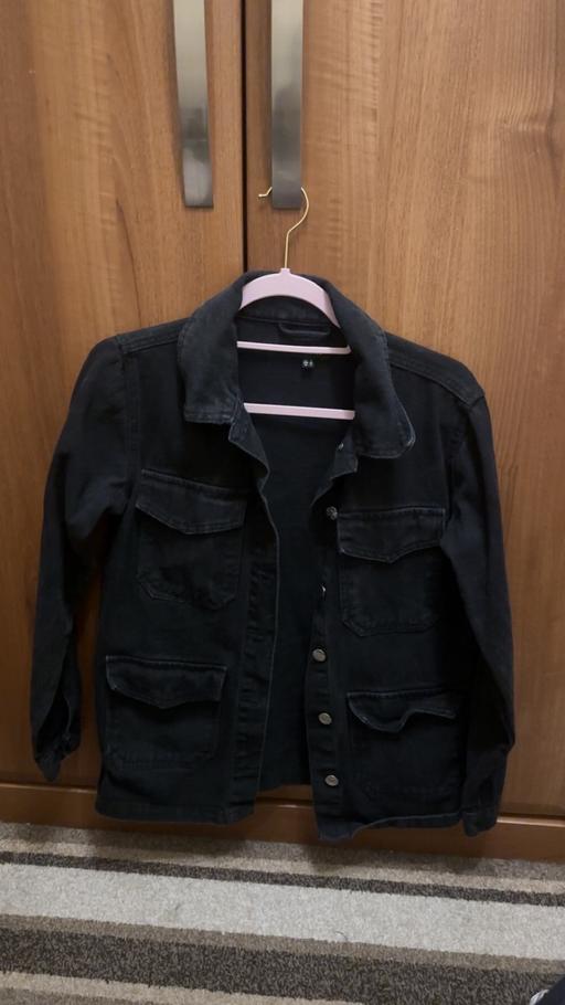  — Women’s black denim jacket