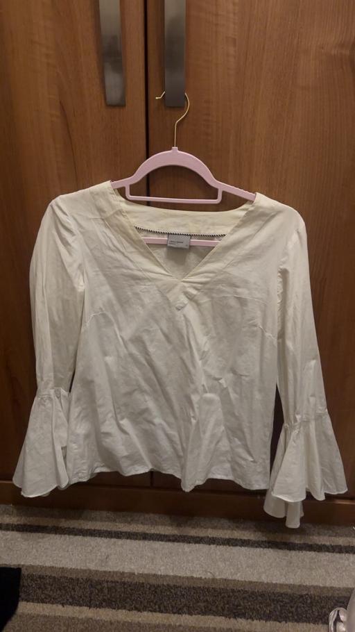  — Women’s cute bell sleeve white shirt top