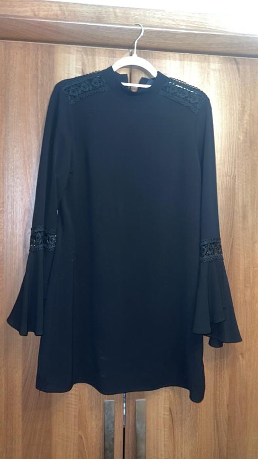  — Women’s cute net sleeve black dress